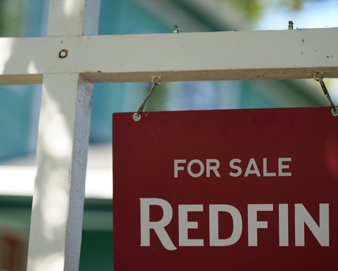 For Sale sign displayed outside a home in Portland Oregon as US mortgage rate falls to 6.48 percent June 2026