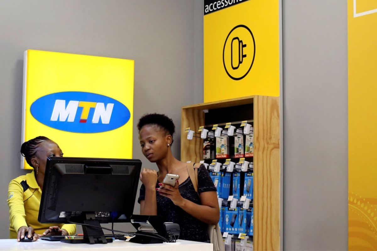 A customer being served at a mobile phone shop