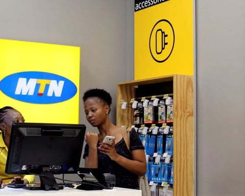 A customer being served at a mobile phone shop