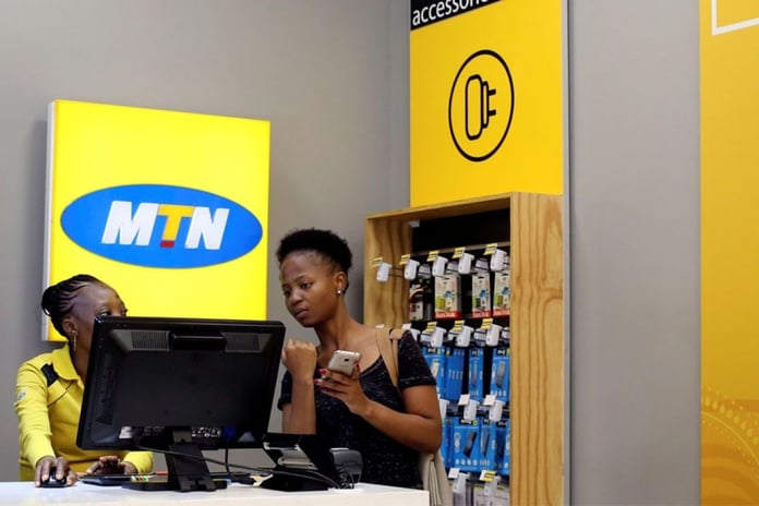 A customer being served at a mobile phone shop