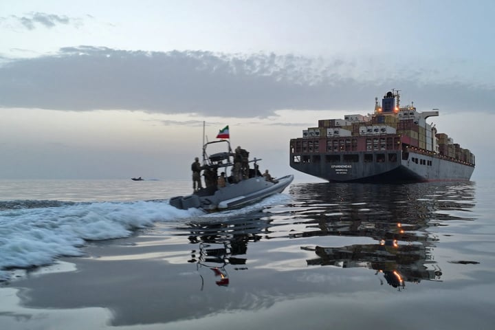 Iranian Revolutionary Guard fast boat in the Strait of Hormuz as US strikes test the Iran ceasefire