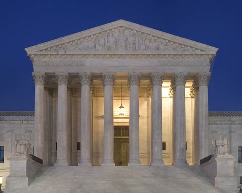 US Supreme Court building at dusk where judges ruled 6-3 in Mullin v. Doe on TPS