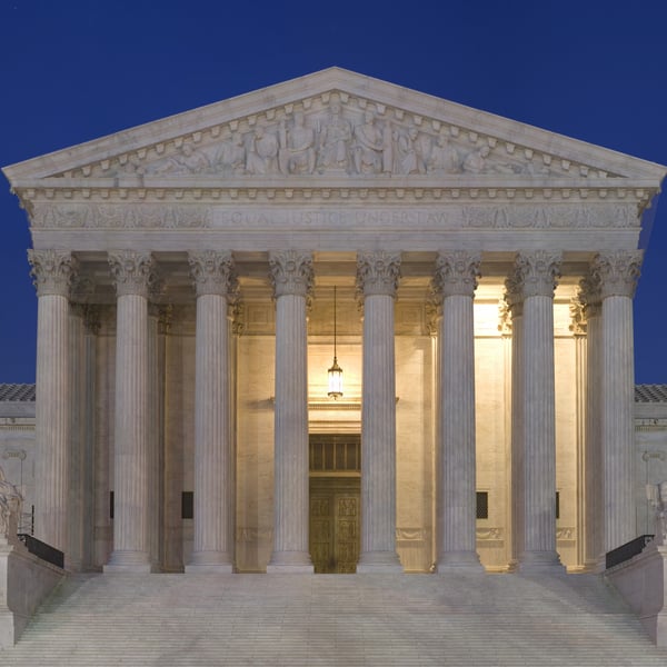 US Supreme Court building at dusk where judges ruled 6-3 in Mullin v. Doe on TPS