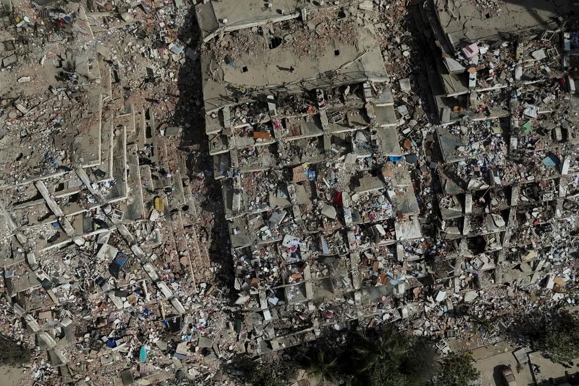 Rescue workers search through rubble after earthquake strikes Venezuela in 2026