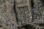 Rescue workers search through rubble after earthquake strikes Venezuela in 2026