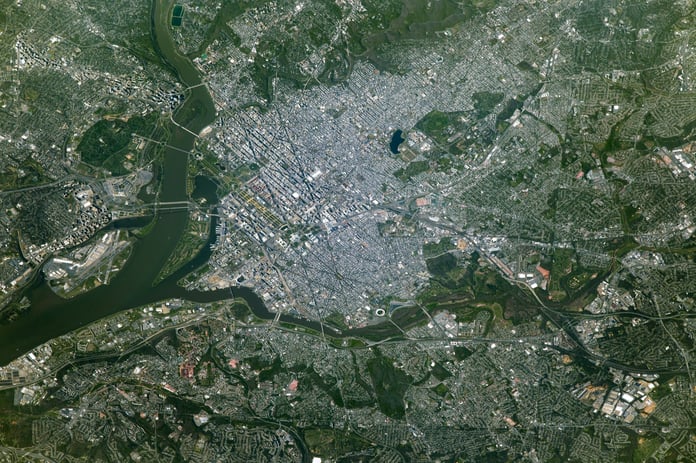 NASA astronaut photograph from the International Space Station of Washington DC showing the Potomac River the National Mall the Tidal Basin and the Kennedy Center on the riverbank with the Lincoln Memorial Washington Monument and US Capitol visible to the east