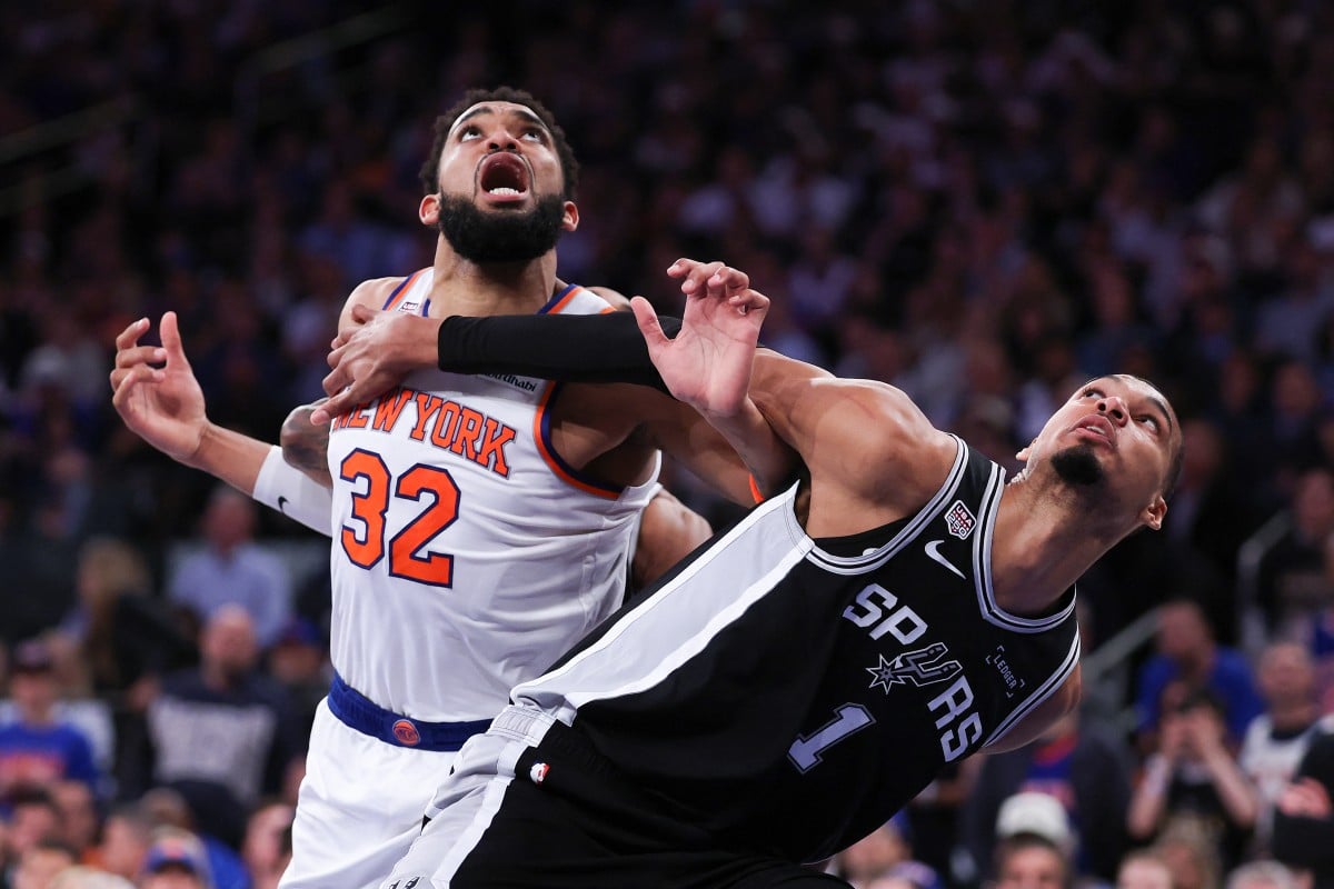 Victor Wembanyama of the San Antonio Spurs battles Karl-Anthony Towns of the New York Knicks during Game 3 of the 2026 NBA Finals