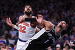 Victor Wembanyama of the San Antonio Spurs battles Karl-Anthony Towns of the New York Knicks during Game 3 of the 2026 NBA Finals