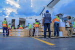 WHO emergency medical supplies being unloaded at a DRC airstrip during the 2026 Bundibugyo Ebola outbreak in Ituri Province
