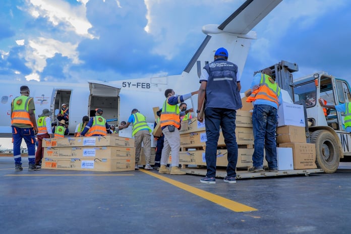 WHO emergency medical supplies being unloaded at a DRC airstrip during the 2026 Bundibugyo Ebola outbreak in Ituri Province