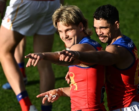 Will Ashcroft and Charlie Cameron celebrate a goal for Brisbane Lions against Richmond Tigers at Ninja Stadium Hobart Round 14 2026