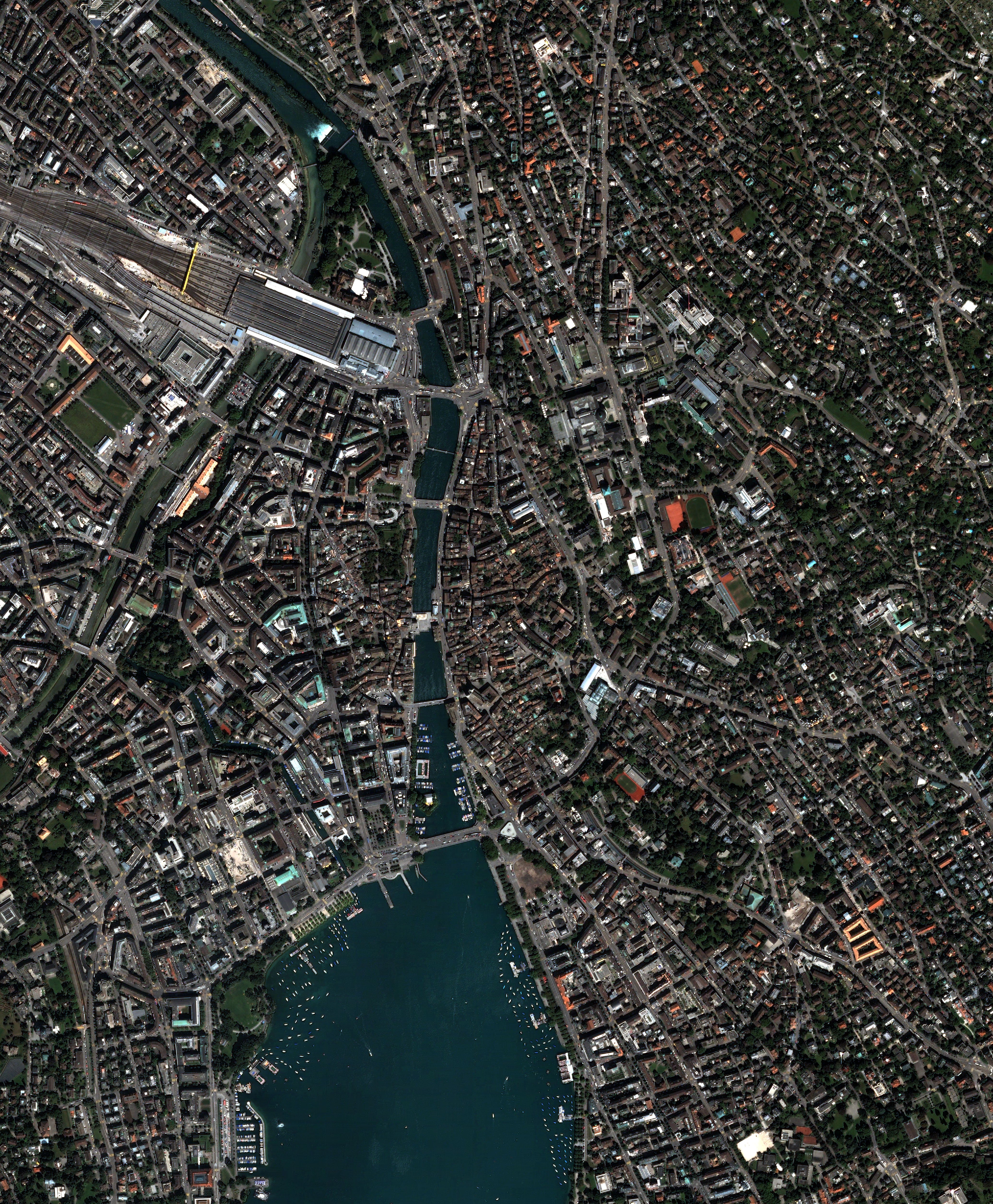 NASA Quickbird satellite high-resolution image of downtown Zurich Switzerland showing the city centre along Lake Zurich with the Limmat River and the Bahnhofstrasse commercial district