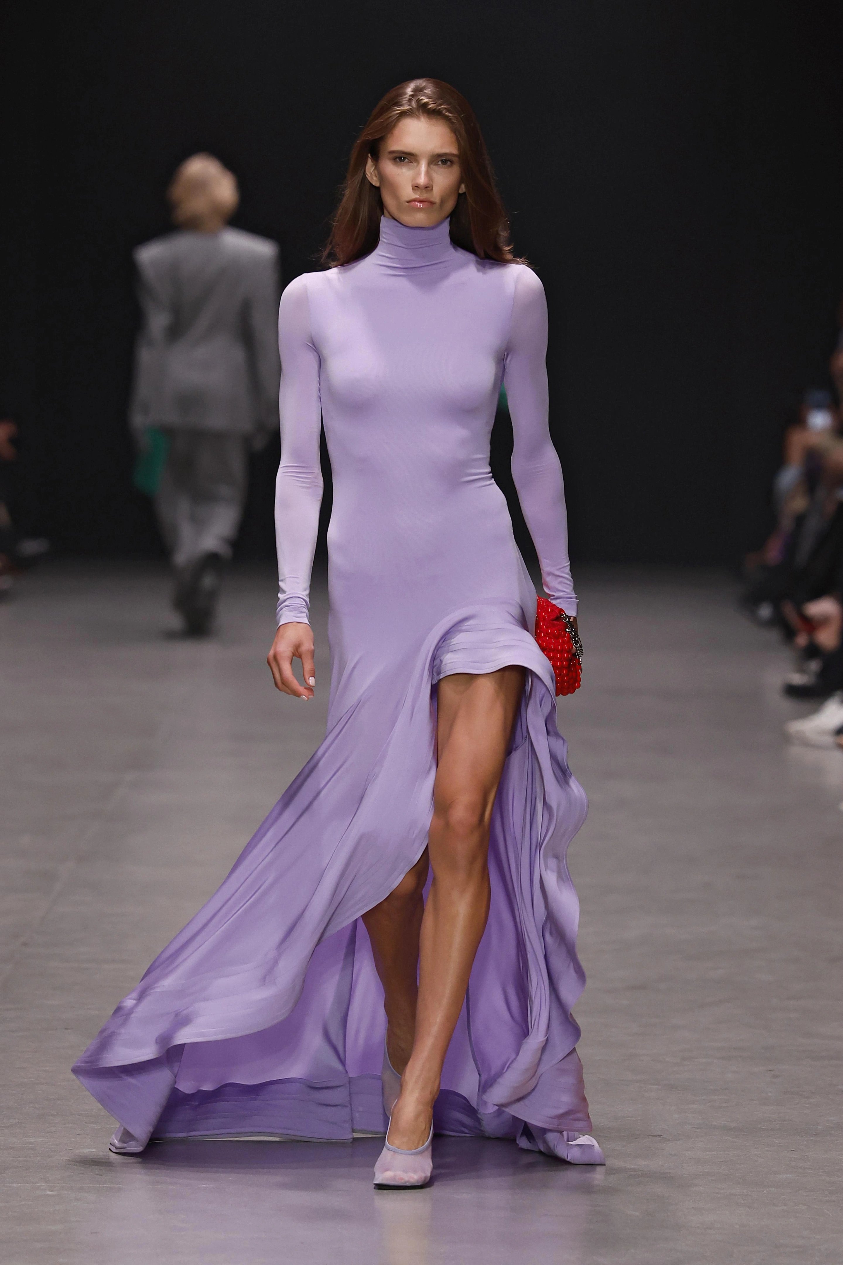 Stella McCartney spring-summer 2026 lilac dress with red clutch