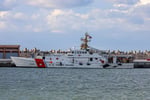 US Coast Guard Fast Response Cutter Glen Harris transiting the Strait of Hormuz with Iranian coastline in the background
