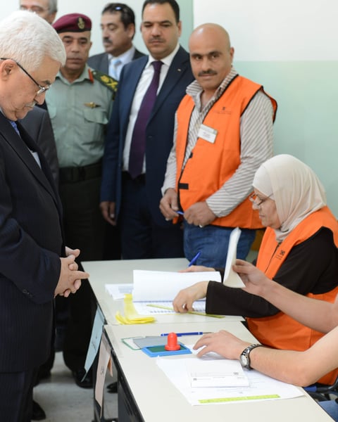 Palestinian President Mahmoud Abbas casts ballot at polling station