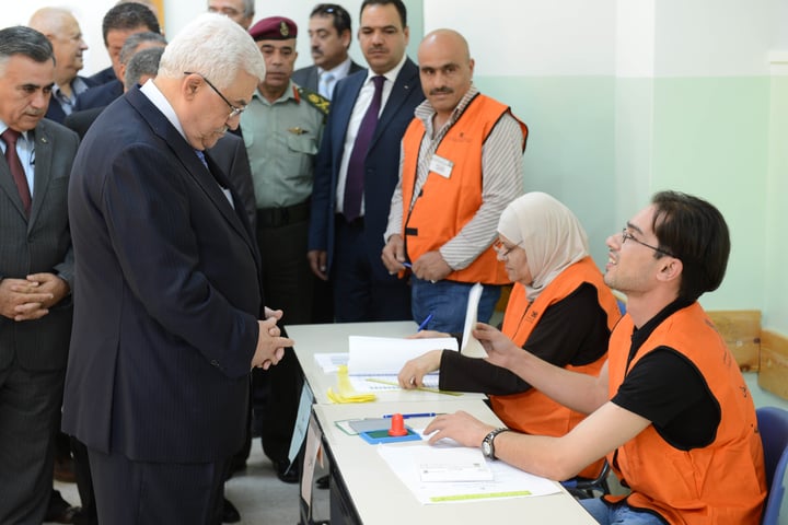 Palestinian President Mahmoud Abbas casts ballot at polling station