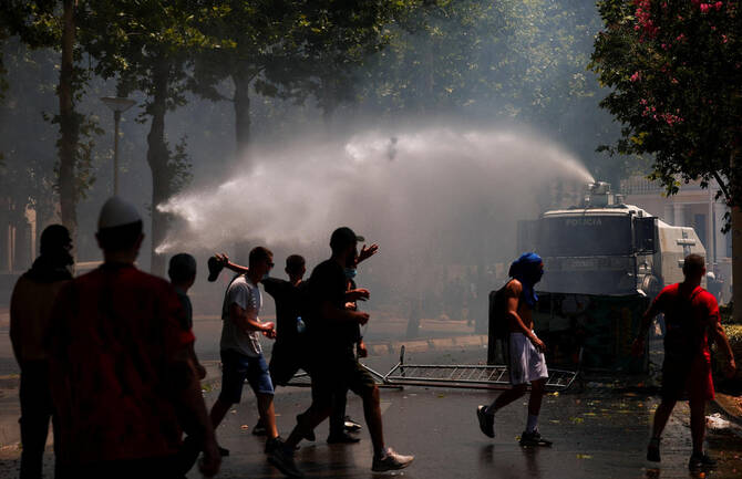 Protesters gather outside Albanian parliament in Tirana during Kushner resort demonstrations July 2026