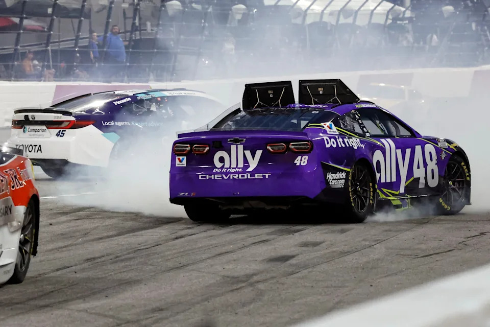 Alex Bowman and Tyler Reddick spin in Turn 2 at North Wilkesboro on July 19 2026