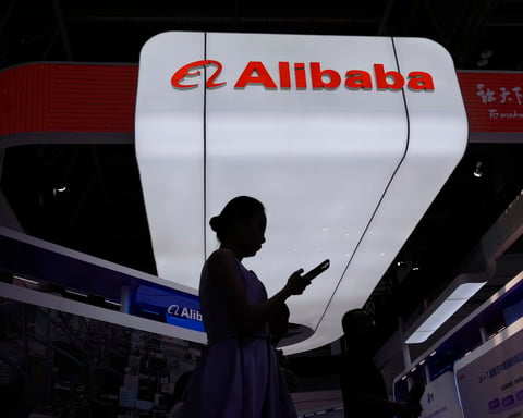 Alibaba logo and e-commerce platform as company agrees to $600 million DOJ settlement over illegal drug sales
