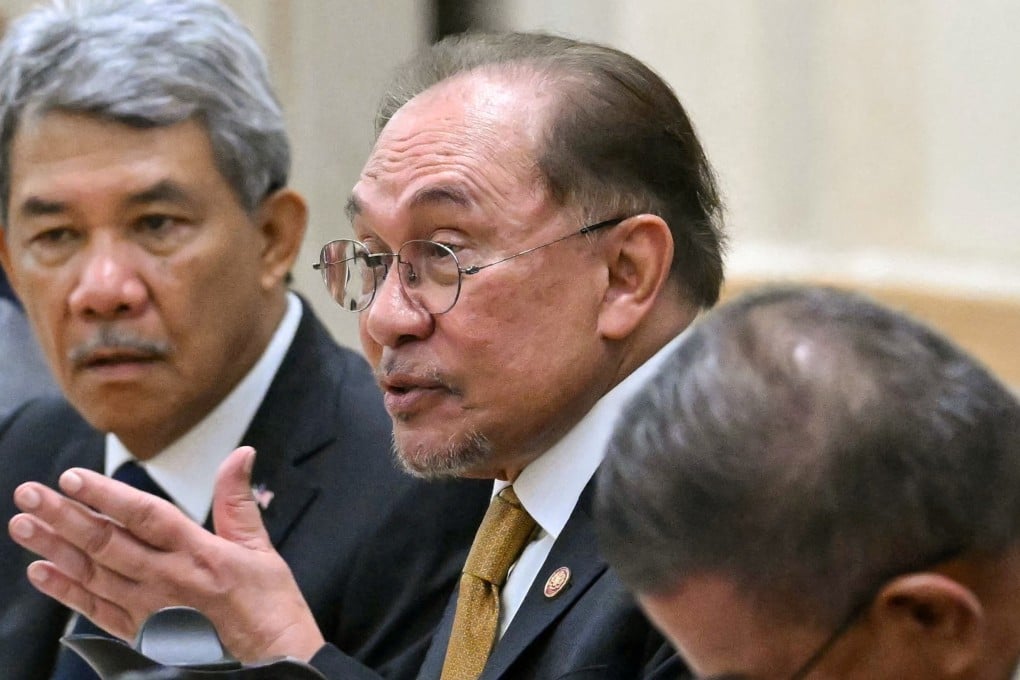 Malaysian Prime Minister Anwar Ibrahim at the federal government office in Putrajaya defending Malaysia's Israel entry ban