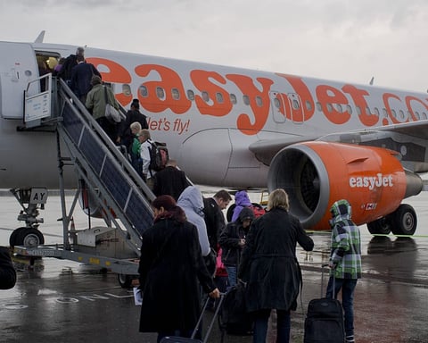 EasyJet aircraft at airport as Apollo bids 5.7 billion pounds for airline takeover