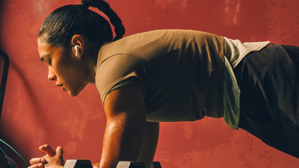 Apple AirPods Pro 3 lifestyle photo showing earbuds in use