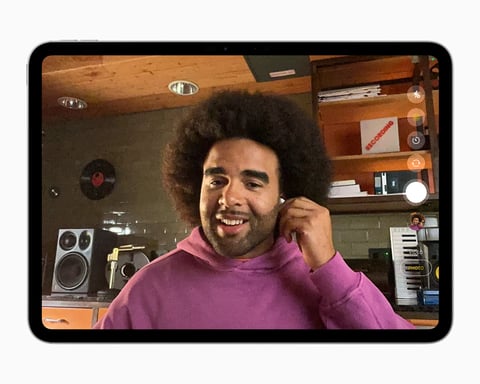 Apple AirPods shown at WWDC 2025 announcement for studio-quality audio and camera remote features