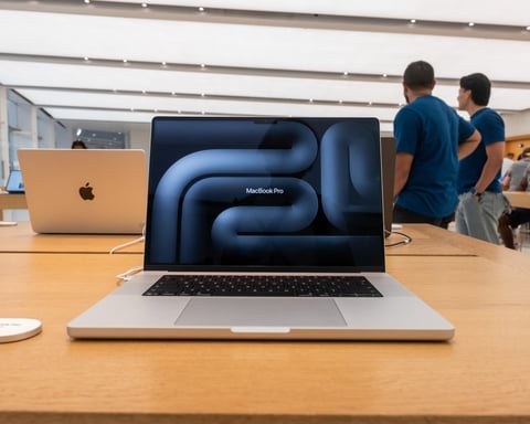 Apple MacBook and iPad products on display as company raises prices due to AI memory chip shortage