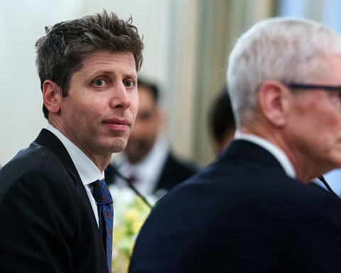 Apple CEO Tim Cook and OpenAI CEO Sam Altman at an event