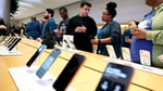 Customers at the Apple Store in New York City with iPhone 17 on display during Apple Q3 FY2026 earnings quarter