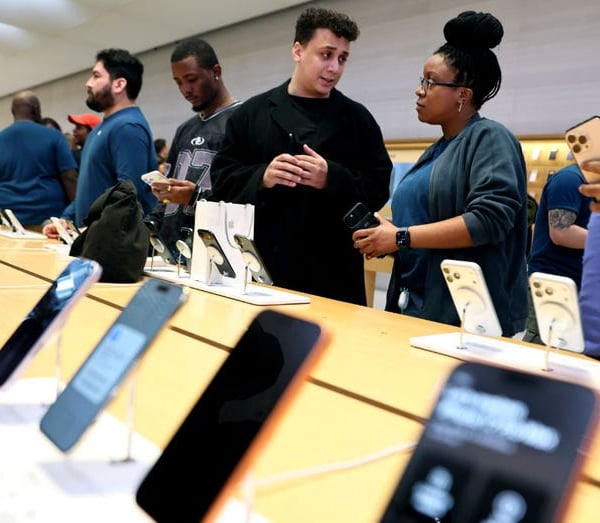 Customers at the Apple Store in New York City with iPhone 17 on display during Apple Q3 FY2026 earnings quarter
