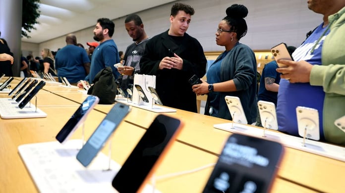 Customers at the Apple Store in New York City with iPhone 17 on display during Apple Q3 FY2026 earnings quarter