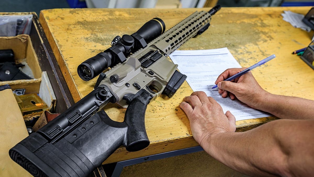AR-15 rifle purchase paperwork and documents representing semiautomatic rifle ownership affected by the Third Circuit’s Second Amendment ruling