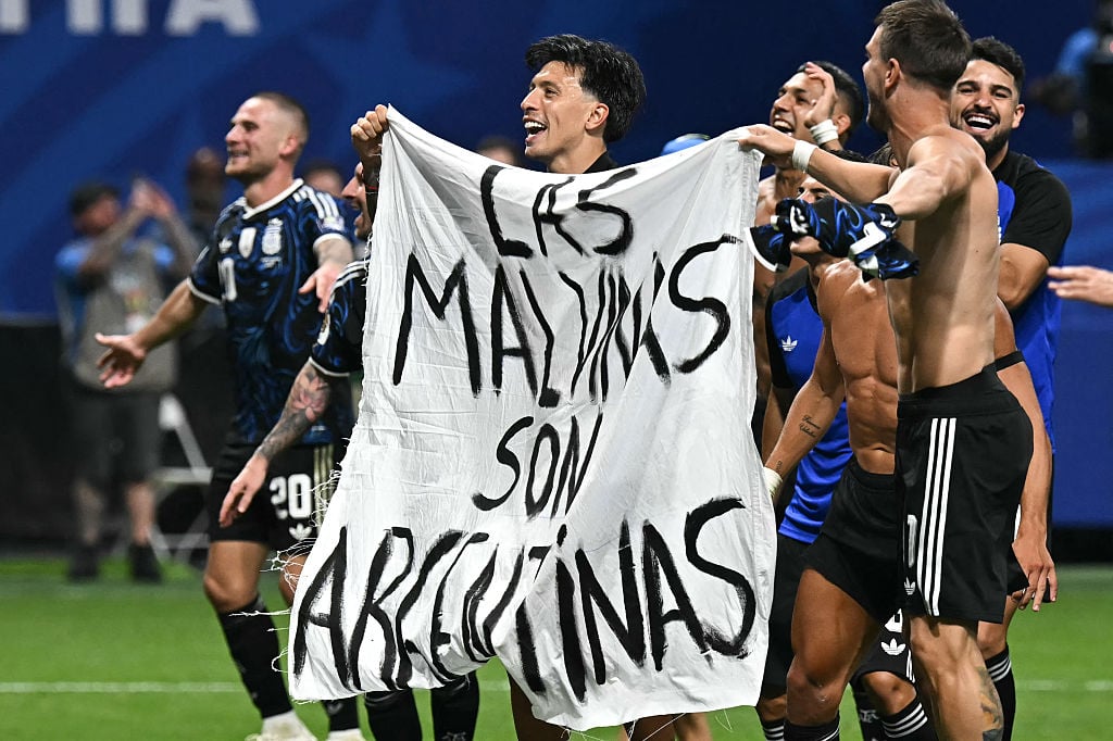 Argentina players display a Malvinas banner at the 2026 World Cup semi-final at Atlanta Stadium
