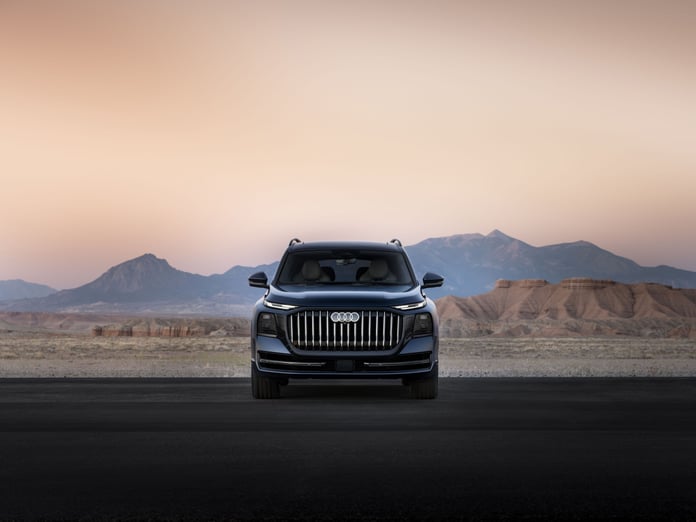 2027 Audi Q9 flagship SUV exterior in silver on a dark background