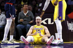 Austin Reaves celebrating with Los Angeles Lakers teammates after signing record NBA contract