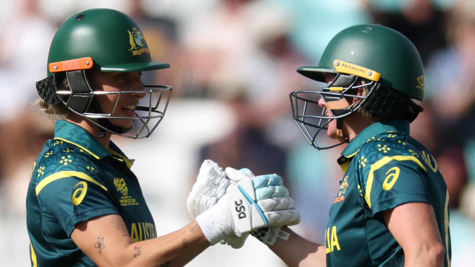 Beth Mooney and Ashleigh Gardner celebrate Australia's eight-wicket win over West Indies in the Women's T20 World Cup semifinal at The Oval