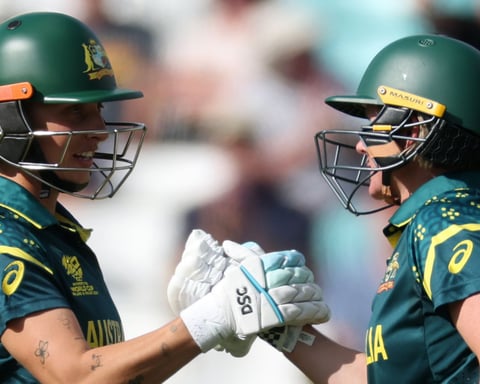 Beth Mooney and Ashleigh Gardner celebrate Australia's eight-wicket win over West Indies in the Women's T20 World Cup semifinal at The Oval