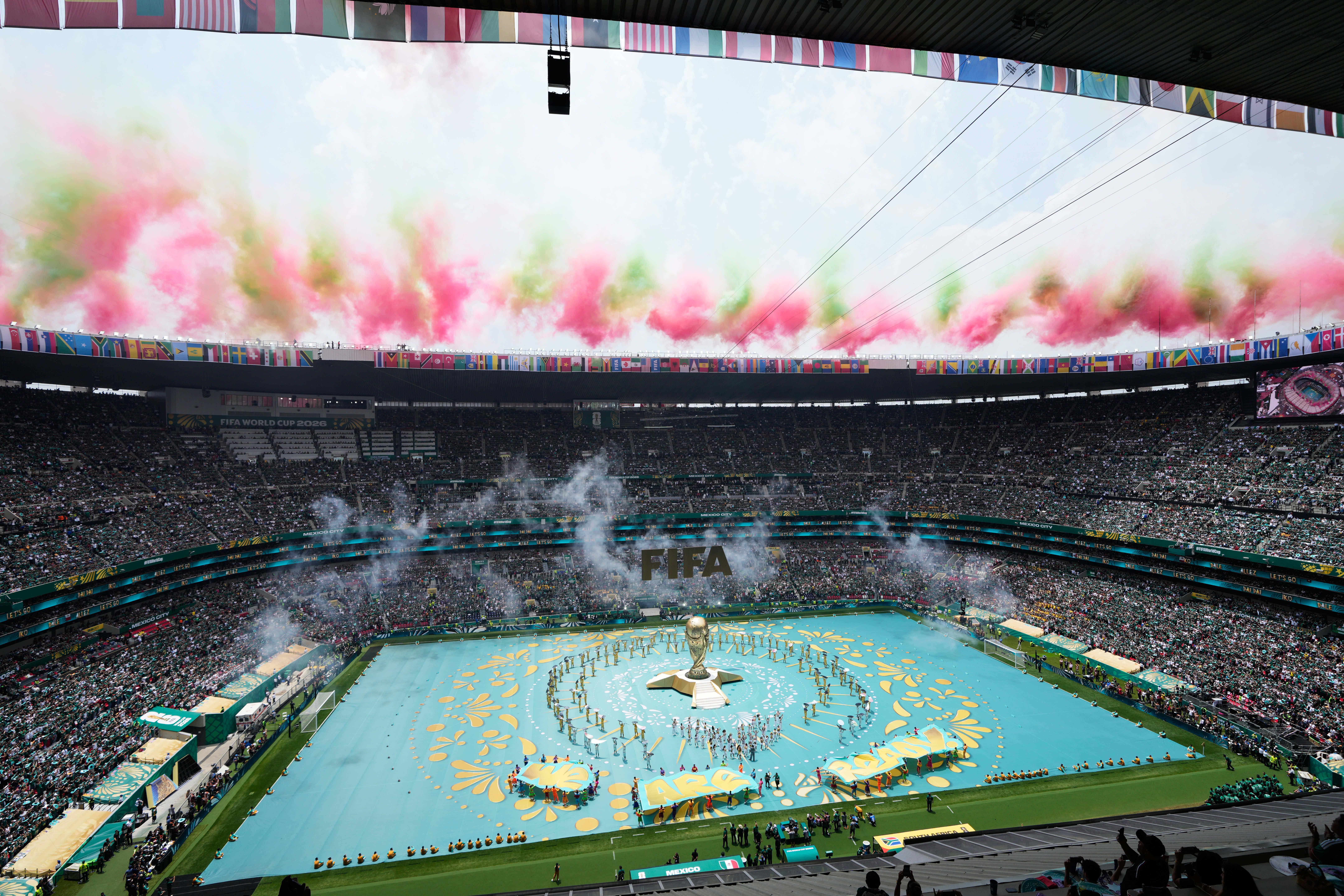 Performers on the pitch at Estadio Azteca during the 2026 FIFA World Cup opening ceremony in Mexico City