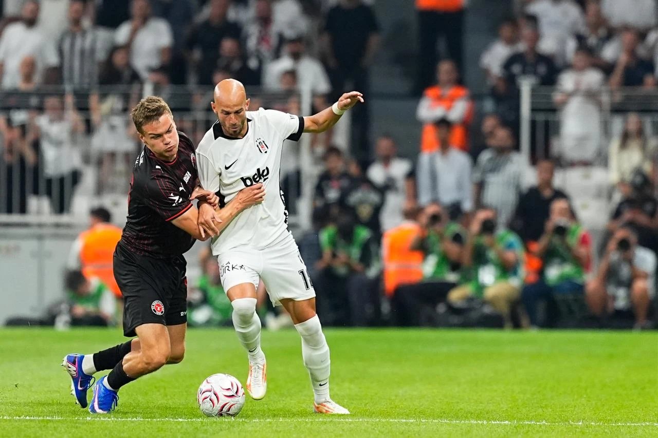 Vaclav Cerny of Besiktas competes with Victor Bak Jensen of FC Midtjylland during the Europa League second qualifying round first leg at Tupras Stadium Istanbul Turkey July 23 2026