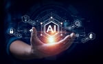 Businessman interacting with artificial intelligence visualization representing Bhavin Turakhia's Neo AI workplace platform