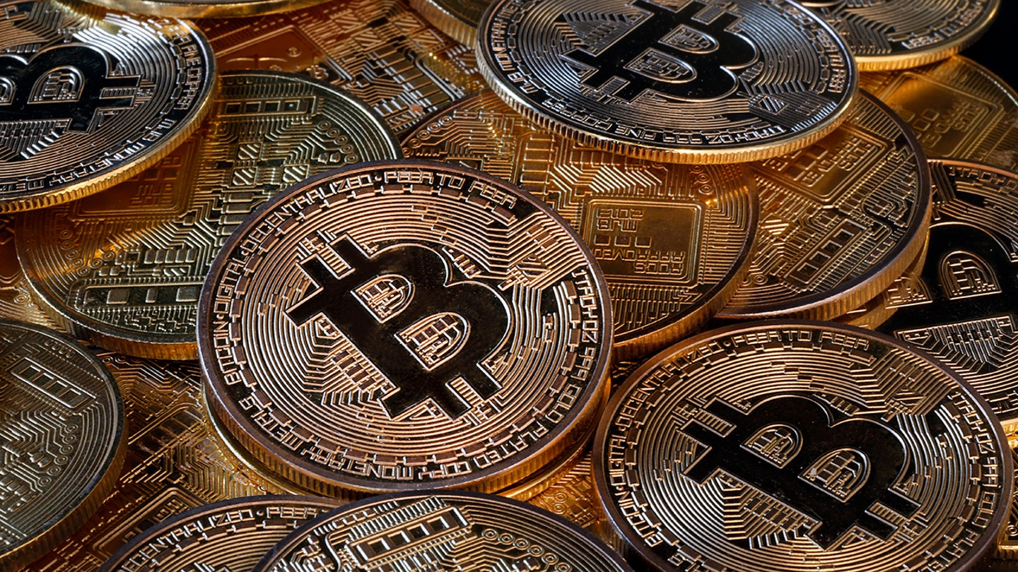 Stack of Bitcoin coins representing the $722 million BitClub Network crypto Ponzi scheme