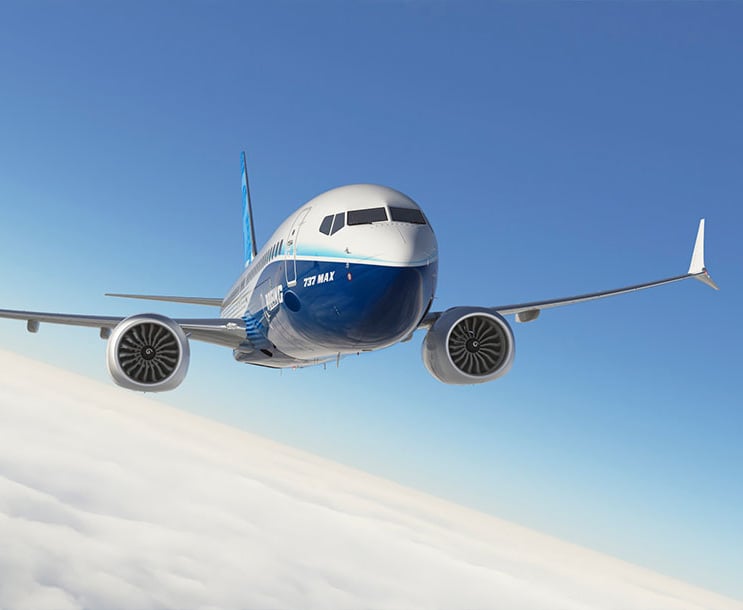 A Boeing 737 MAX aircraft on the tarmac, one of Boeing's key commercial jets returning to positive deliveries in Q2 2026