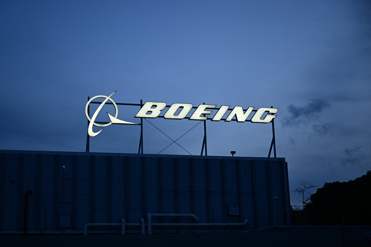 Boeing company logo sign outside corporate offices near Los Angeles International Airport January 2024