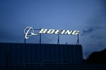 Boeing company logo sign outside corporate offices near Los Angeles International Airport January 2024