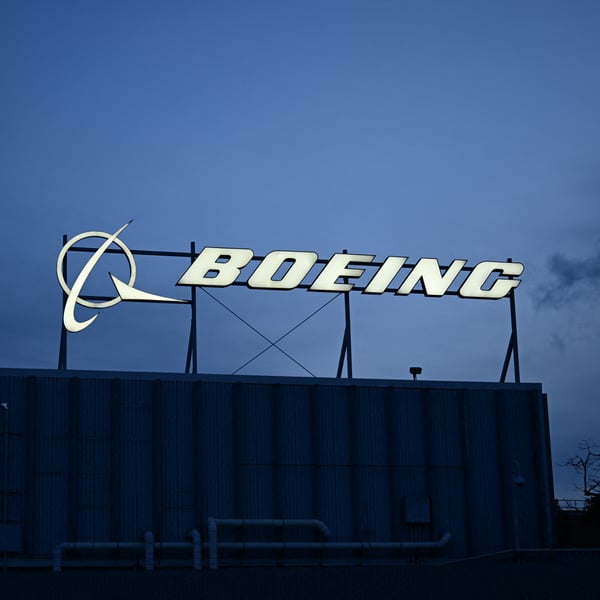 Boeing company logo sign outside corporate offices near Los Angeles International Airport January 2024