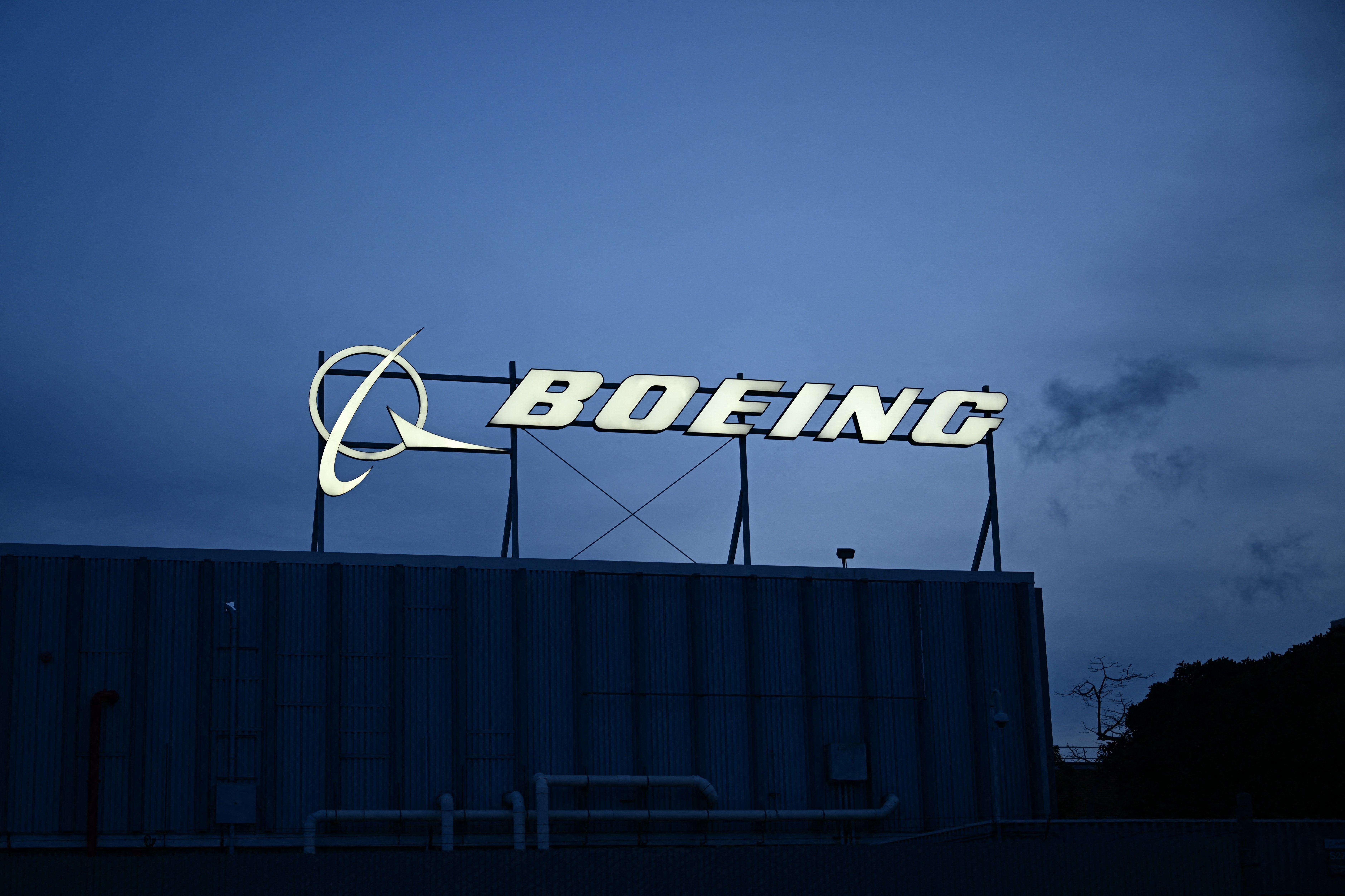 Boeing company logo sign outside corporate offices near Los Angeles International Airport January 2024