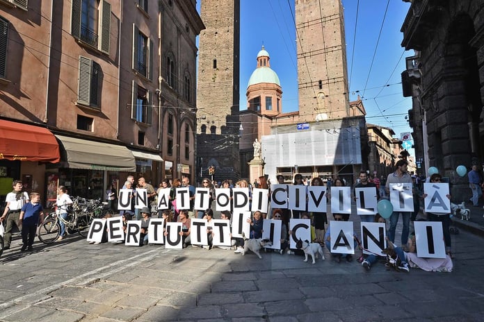 Protesters gather in the streets of Bologna during demonstration after death in police custody