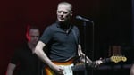 Canadian rock singer Bryan Adams performing on stage