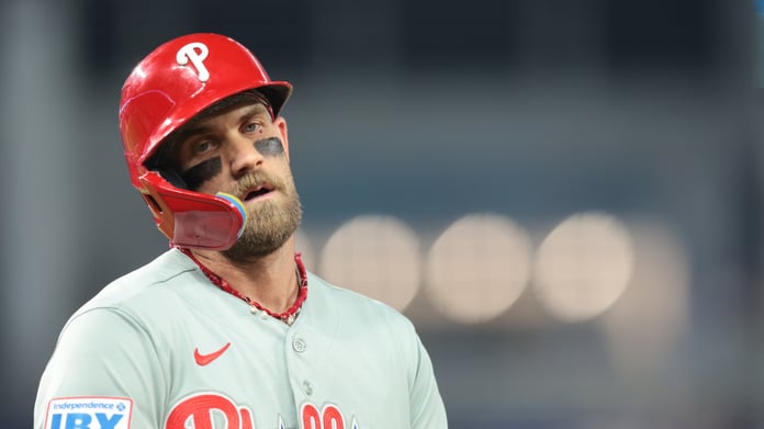 Bryce Harper in the Philadelphia Phillies dugout as the August 3 MLB trade deadline approaches